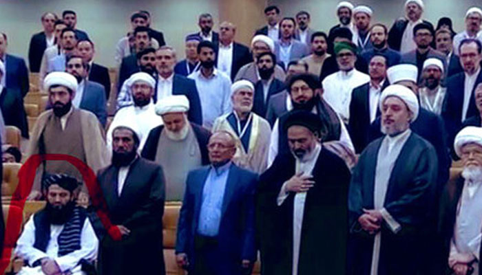 The screenshot shared by journalist Ihsanullah Tipu Mehsud on September 19, 2024, shows an Afghan official (encircled) sitting during the playing of Iran’s national anthem at an event in Tehran. —X/ IhsanullahTipuMehsud/file