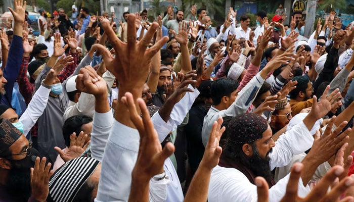 A representational image showing a large number of people attending a demonstration. — Reuters/File