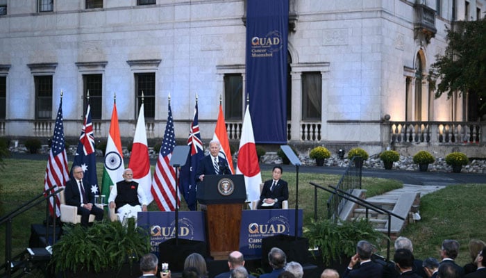 US President Joe Biden (C), alongside Australian PM Anthony Albanese, Indian PM Narendra Modi, and Japanese PM Fumio Kishida, speaks about the Quadrilateral Cancer Moonshot during the Quadrilateral Summit at the Archmere Academy in Wilmington, Delaware, on September 21, 2024. — AFP