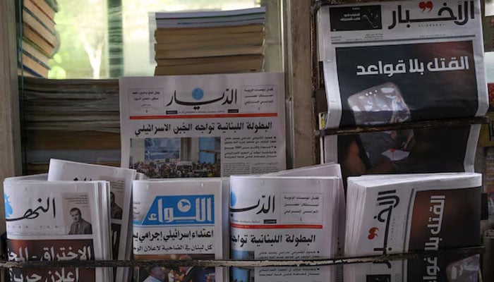 A newsstand shows headlines following pager detonations across Lebanon in Beirut, Lebanon September 18, 2024. — Reuters