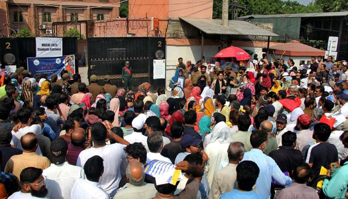 A large number of students gathers outside the Lahore College for Women University to attend the Entry Test of Medical and Dental College Admission Test (MDCAT), at Jail Road in Lahore on September 22, 2024. — PPI