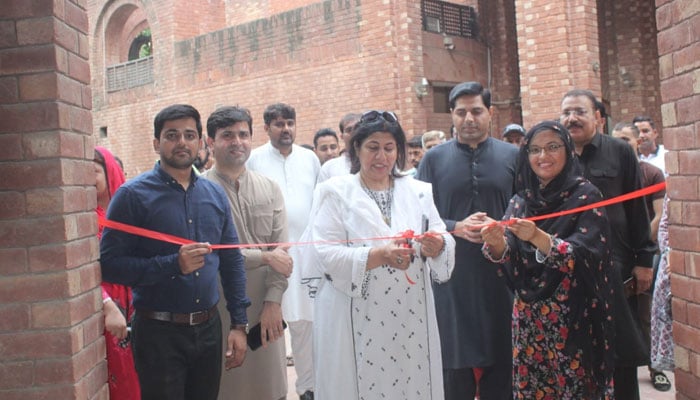 Director General PILAC Benish Fatima Sahi (right) and Dr Samira Javed inaugurate an Islamic calligraphy exhibition organised by the PILAC at the Gaddafi Stadium’s Punjabi Art Gallery on September 19, 2024. — Facebook/PILAC