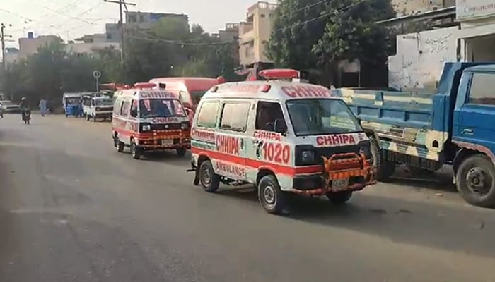 Chhipa ambulances carry the bodies of unidentified persons in Karachi in this undated photo. — Reporter