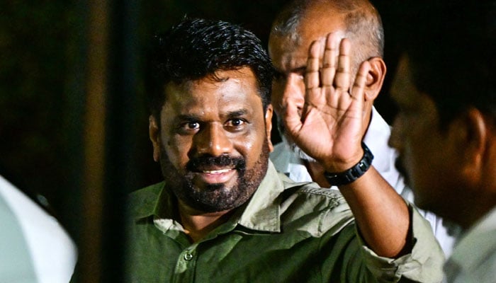 Sri Lankas president-elect Anura Kumara Dissanayaka, gestures upon his arrival at the Election Commission office in Colombo on September 22, 2024. — AFP