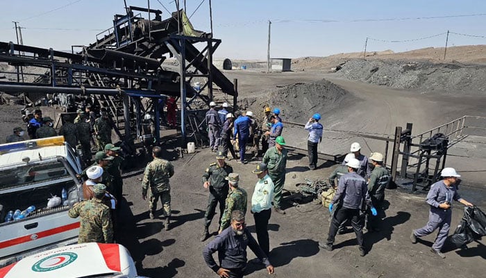 A handout picture provided by the Iranian Red Crescent (RCS) shows security forces gathered at the scene of a blast at a coal mine in Tabas in Irans Khorasan province on September 22, 2024. — AFP