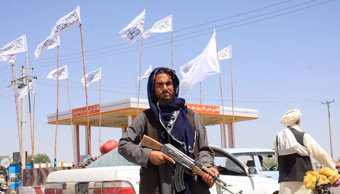 A Taliban fighter looks on as he stands at the city of Ghazni, Afghanistan August 14, 2021. — Reuters