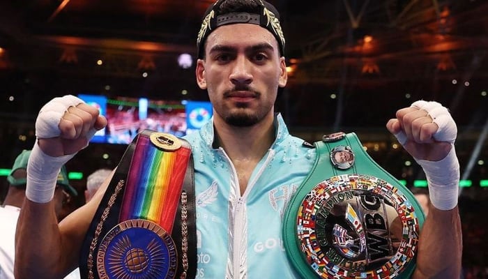 Hamzah Sheeraz posing with his belts after clinching the Middleweight European Boxing title. — Hamzah Sheeraz management/File