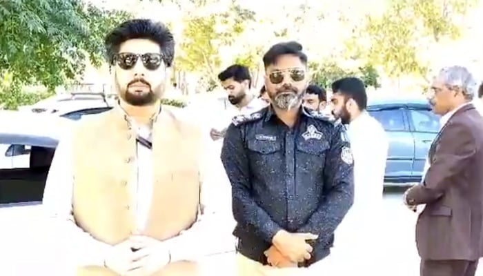 Director Excise and Taxation Department Bilal Azam is expressing his views to the public on online video, on this occasion a police official is also present seen in this image. — X/@bilalazam_ict/File