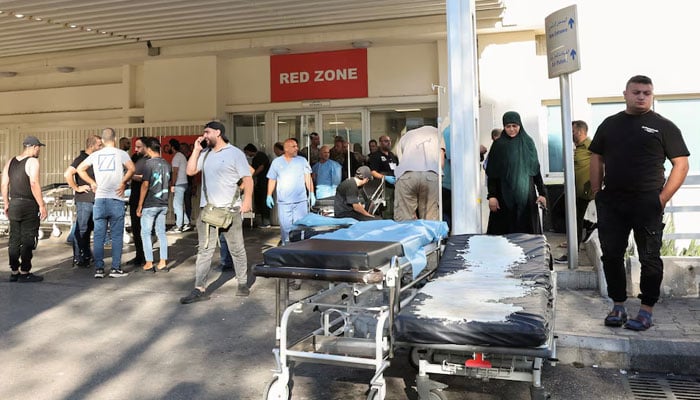 People gather outside a hospital after several people were seriously wounded when pagers exploded in Beirut, Lebanon September 17, 2024. — Reuters