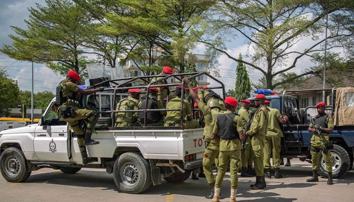 Tanzanian police officers patrol the streets ahead of a demonstration over the alleged kidnapping and killing of opposition members in Dar es Salaam on September 23, 2024. — AFP