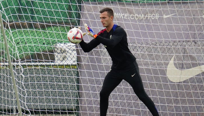 Inaki Pena taking part in a training session ahead of the Spanish league football match between Valencia and Barcelona on August 16, 2024. — AFP