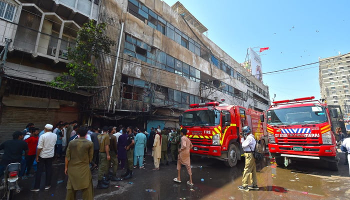 Emergency crews responded to a fire that broke out at the Noman Center building outside in the Saddar area on September 24, 2024. — INP