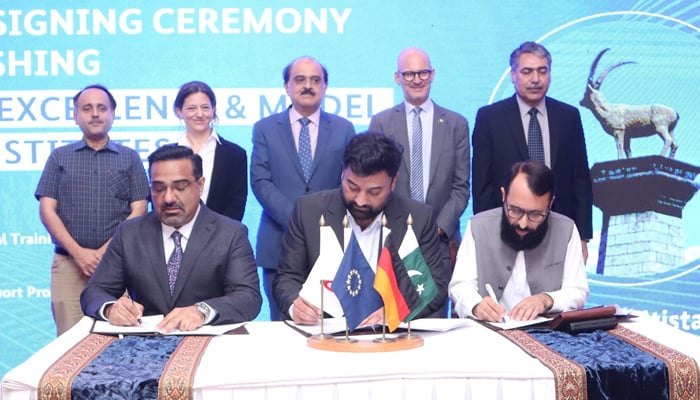 Head of the TVET Sector Support Programme Dr. Mansoor Zaib Khan (centre) Executive Director of NAVTTC Mohammed Amir Jan (left) are singing documents and Secretary of Education Mohyuddin Ahmad Wani, European Union Deputy Ambassador Philipp Oliver Gross and other are seen in this image released on September 24, 2024. — Facebook/@NAVTTCOfficial