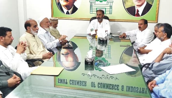 President of Swat Chamber of Commerce and Industry Rahat Ali Khan and other officials are addressing an emergency meeting regarding the Jehanabad incident seen in this image released on September 23, 2024. — Facebook/@swatchambercommerce