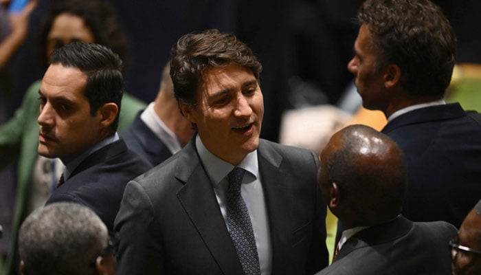 Canadian Prime Minister Justin Trudeau (C) attends the 79th Session of the United Nations General Assembly at the United Nations headquarters in New York City on September 24, 2024. — AFP