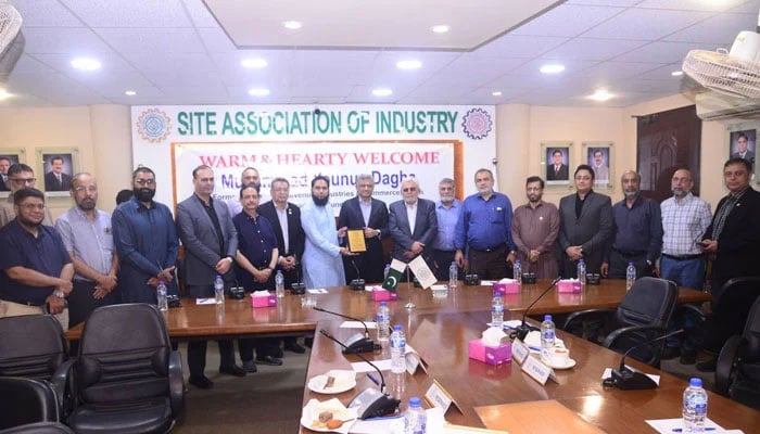 President Muhammad Kamran Arbi is presenting the Association’s crest to former Minister of Industries Younus Dagha on the occasion of a reception hosted in his honor on 06-June-2024. — Facebook/SiteAssociation