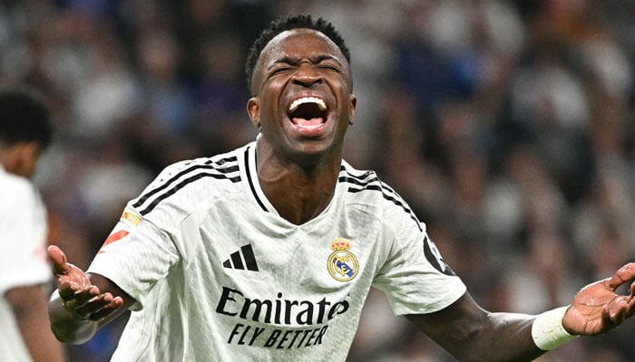 Real Madrids Brazilian forward #07 Vinicius Junior reacts during the Spanish league football match between Real Madrid CF and Deportivo Alaves in Madrid on September 24, 2024. — AFP