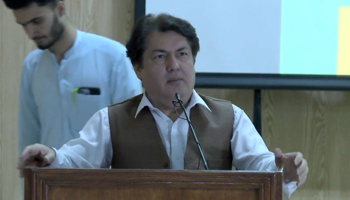 Adviser to KP CM on Information Barrister Muhammad Ali Saif addresses an event on June 13, 2024. — Screengrab via Facebook/@BarristerDrSaif