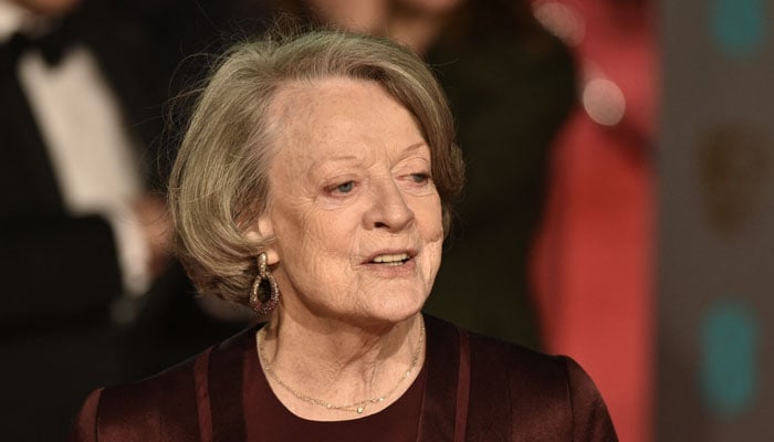 British actress Maggie Smith poses on arrival for the BAFTA British Academy Film Awards at the Royal Opera House in London on February 14, 2016. — AFP