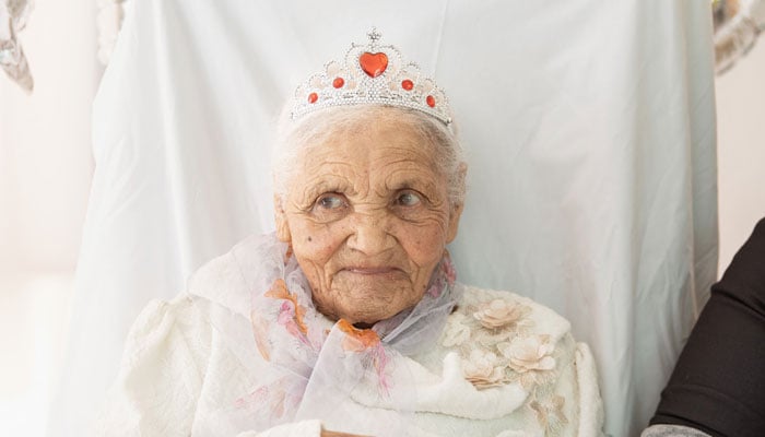 Margaret Maritz looks on while celebrating her 118th birthday in an old-age home in Touwsrivier on September 27, 2024, about 200km from Cape Town. — AFP