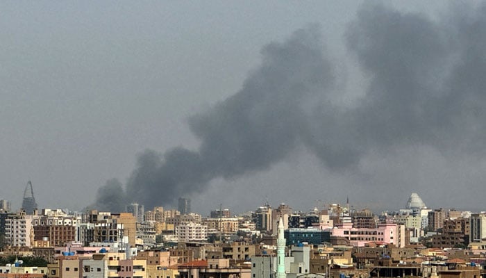 Smoke billows during air strikes in central Khartoum as the Sudanese army attacks positions held by the paramilitary Rapid Support Forces (RSF) throughout the Sudanese capital on September 26, 2024. — AFP