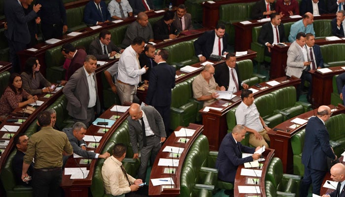 Tunisian members of parliament attend a plenary session to discuss a draft electoral reform in Tunis on September 27, 2024. — AFP