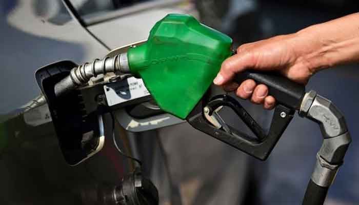 A man fills petrol in a car. — AFP/File