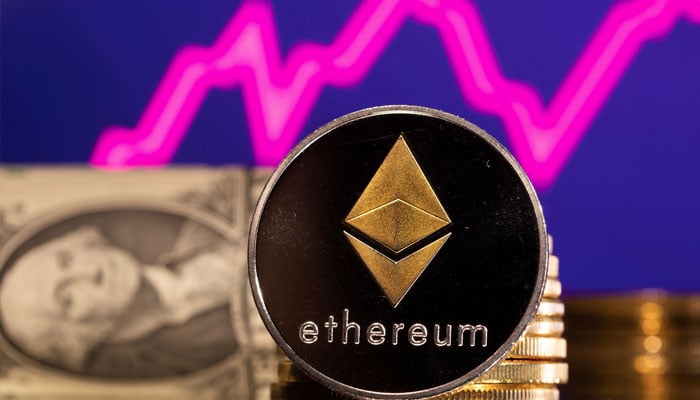 A representations of cryptocurrency Ethereum is seen in front of a stock graph and US dollar in this illustration taken, January 24, 2022. — Reuters