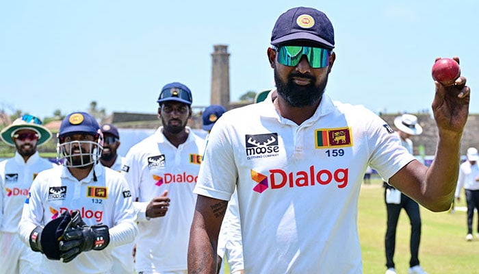 Prabath Jayasuriya celebrates after taking five-wicket haul during the third day of the second Test match in Galle on Saturday. — AFP/file