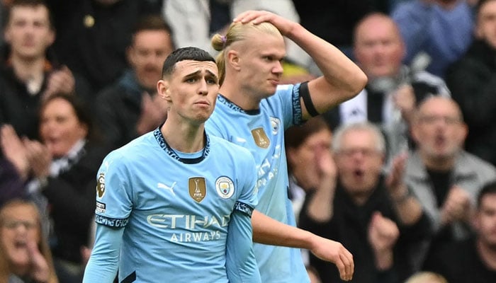 Manchester Citys Phil Foden and Erling Haaland react to a missed chance during their Premier League football match against Newcastle United at St James Park. — AFP/file