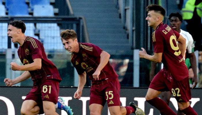 Romas Niccolo Pisilli (left) celebrating after scoring in win over Venezia. — AFP/file