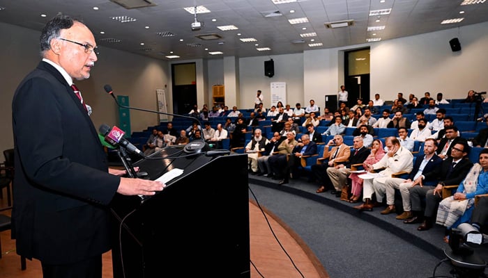 Federal Minister for Planning, Development and Special Initiatives Ahsan Iqbal addressing the participants at the Asia Energy Transition Summit at LUMS University September 29, 2024. — APP