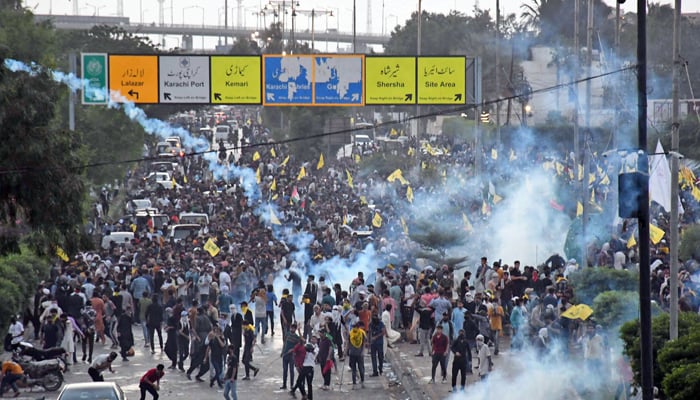 During the anti-Israel demonstration in Karachi over the assassination of the head of the Lebanese Hezbollah movement, Hassan Nasrallah, the Sindh police fired tear gas shells at a large number of protesters to prevent the workers of Majlis Wahdat-e-Muslimeen (MWM) from reaching the US consulate September 29, 2024. — Online