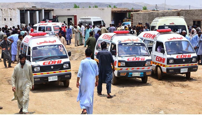 A representational image showing multiple ambulances. — APP/File