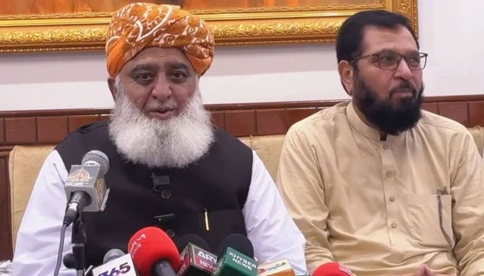 JUI-F Emir Maulana Fazlur Rehman (left) addresses the press conference after intra-party election in Peshawar on September 29, 2024. — Screengrab via Geo News