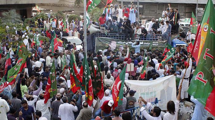 PTI holds protest march demanding release of Imrans