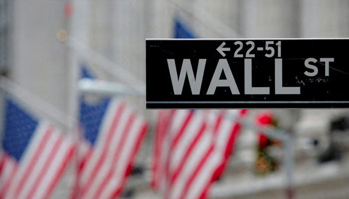 A street sign for Wall Street is seen outside the New York Stock Exchange (NYSE) in Manhattan, New York City, US December 28, 2016. — Reuters