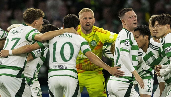 Celtic players seen in a huddle.— AFP/file