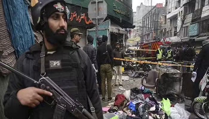 A representational image showing policemen at a terrorist incident site. — AFP/File