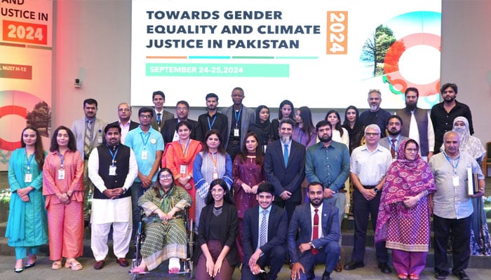 Academics, policymakers, development workers and activists gathered at seen in a group photo at NUST at a conference named Gender, Intersectionality & Climate Change: From Scientific Evidence to Action on September 30, 2024. —Facebook@nustofficial