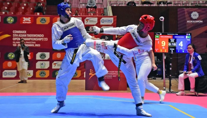 Players of Taekwondo from Pakistan and Saudi Arabia are competing each other during the 5th Asian Open Taekwondo Championship 2023 at Sports Complex in Federal Capital on November 5, 2023. — Online