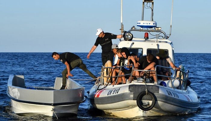 Tunisian coast guards patrol the area off Tunisias northern town of Bizerte on March 30, 2017. — AFP