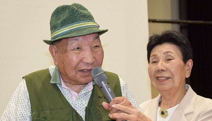 Iwao Hakamada (left) with his 91-year-old sister Hideko (right).— AFP/file