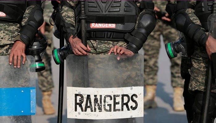 Rangers stand guard near the Faizabad junction in Islamabad on November 26, 2017. — Reuters