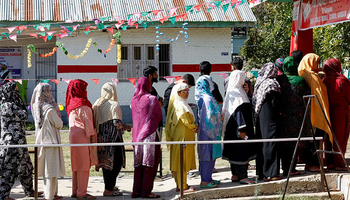 Kashmiri women queue to vote at a polling station, during the third and final phase of assembly elections, in North Kashmirs Handwara, October 1, 2024. —  REUTERS