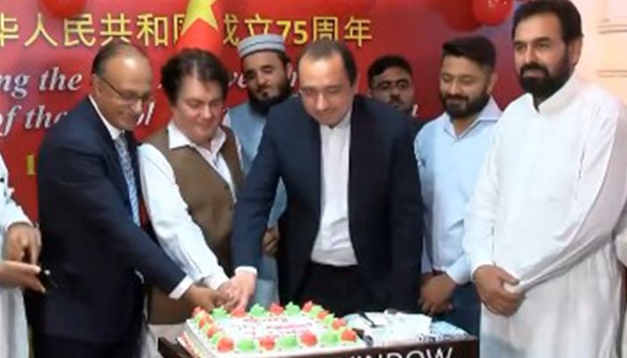 Adviser to Chief Minister on Information Barrister Muhammad Ali Saif (second right) cuts a cake during a  ceremony arranged at the China Window or Chinese Cultural Centre in connection with the 75th National Day celebrations of the People’s Republic of China in this image released on October 1, 20240. — Screengrab via Facebook/@BarristerDrSaif