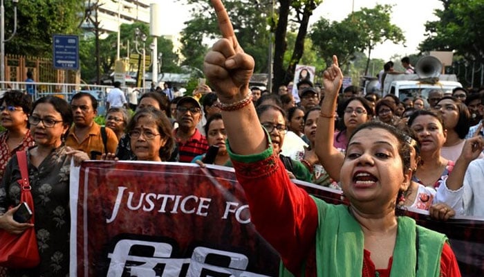 Activists and medical professionals shout slogans as they take part in a protest march to condemn the rape and murder of a doctor in Kolkata on September 20, 2024. — AFP/File