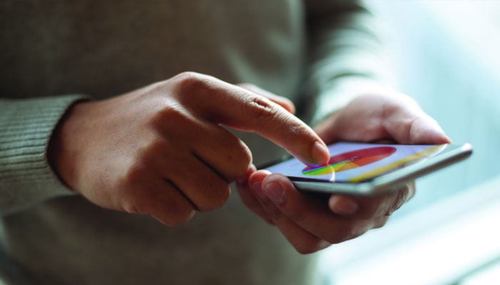 A person using a cell phone.— Reuters/file