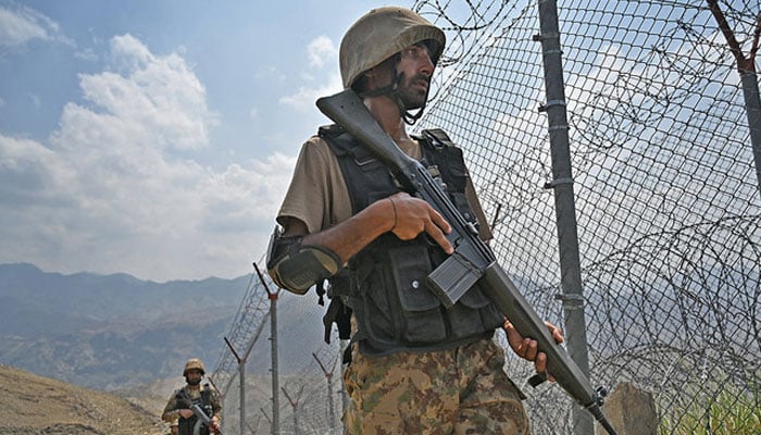 Pakistani troops patrol along Pakistan-Afghanistan border at Big Ben post in Khyber district in Khyber Pakhtunkhwa. — AFP/File