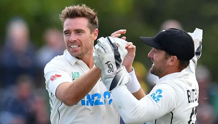 Former skipper of New Zealands red-ball cricket team celebrating a wicket with wicket-keeper batter Tom Blundell during a Test against Australia on March 11, 2024 in Christchurch, New Zealand. — AFP